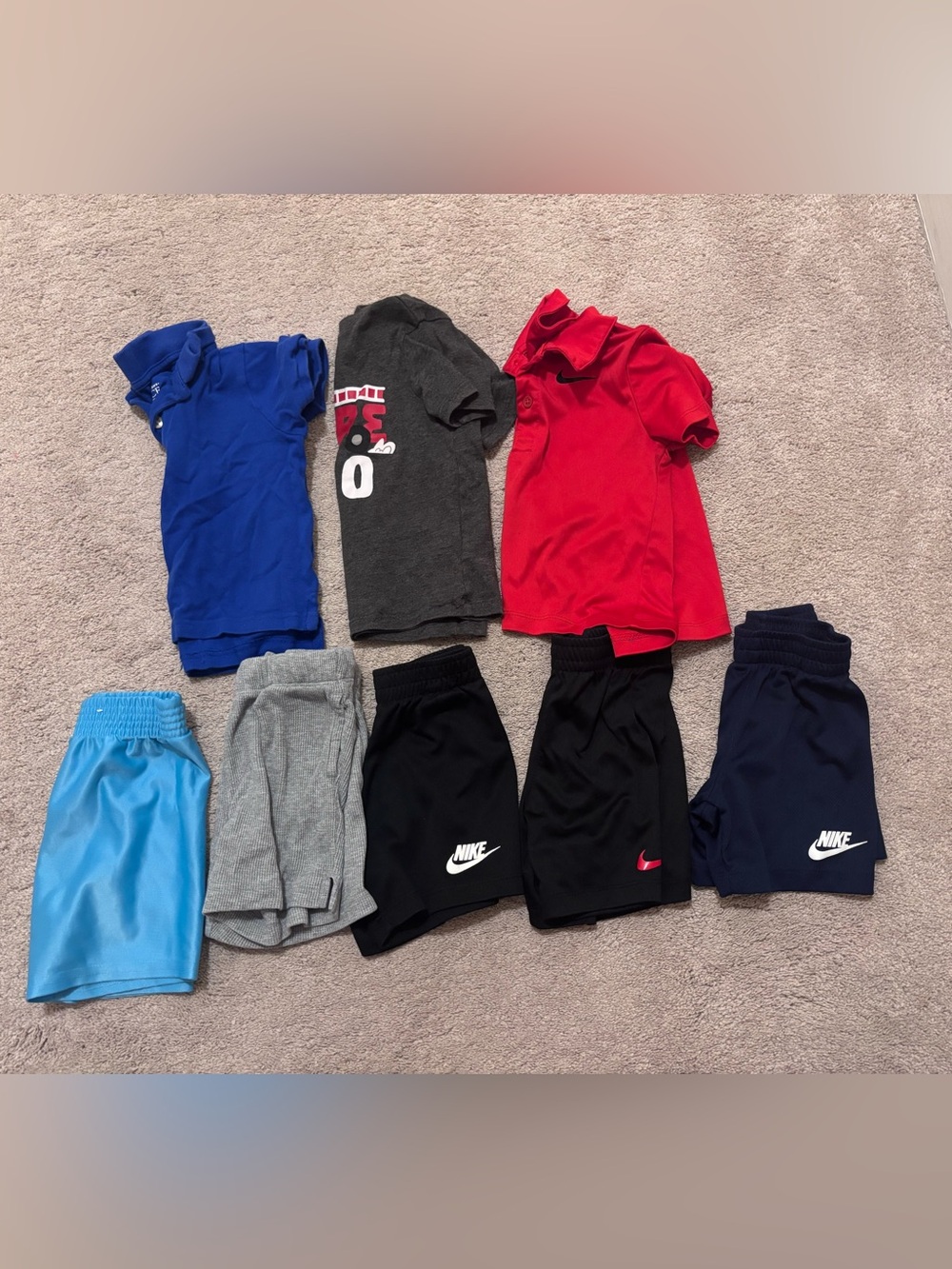 Nike Kids Mix — Black Shorts with Red, Blue, Gray & Light Blue Tops